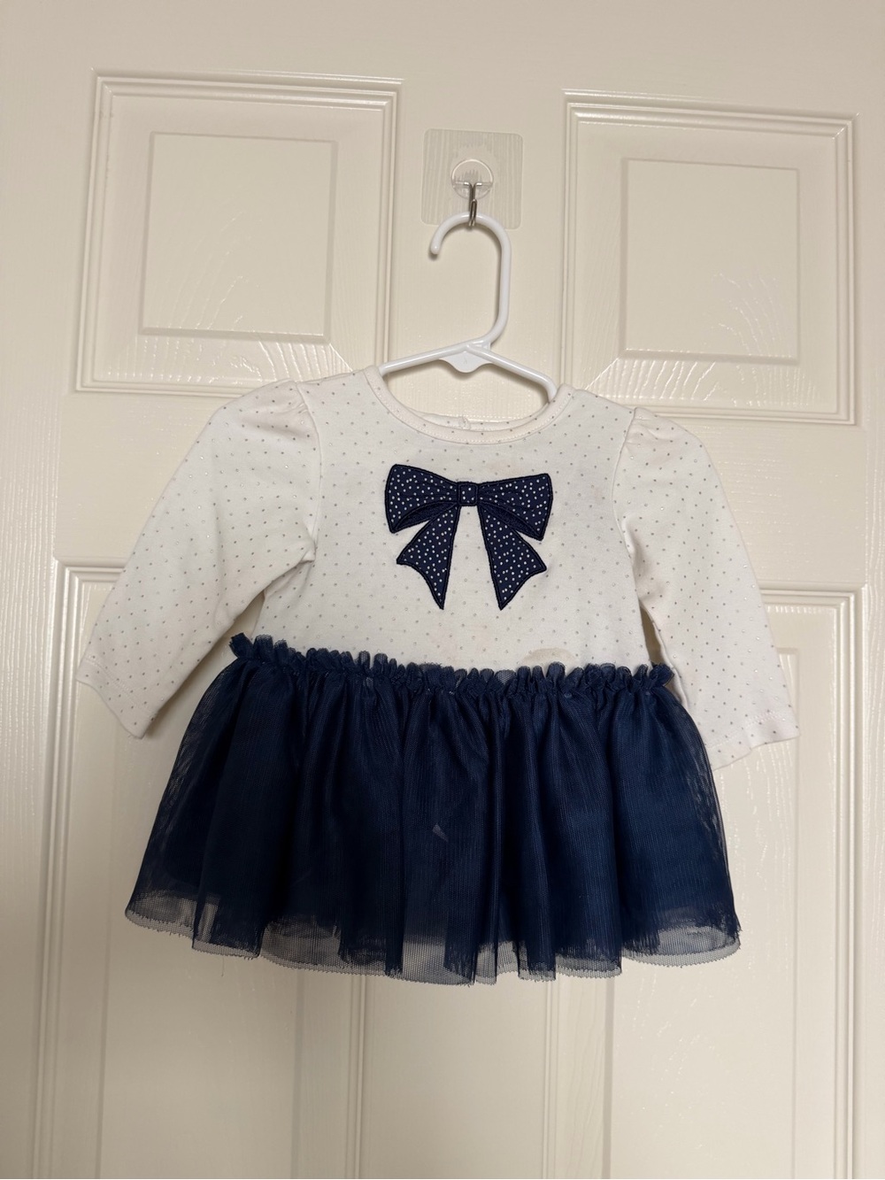 Little Me White Top with Navy Bow and Silver Dots
